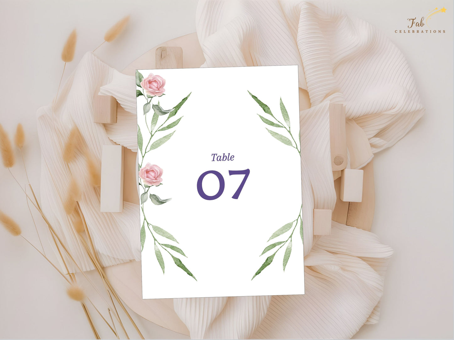 Pink rose wedding table number card design with watercolor roses and refined typography — editable Canva template for graceful, poetic reception presentation.