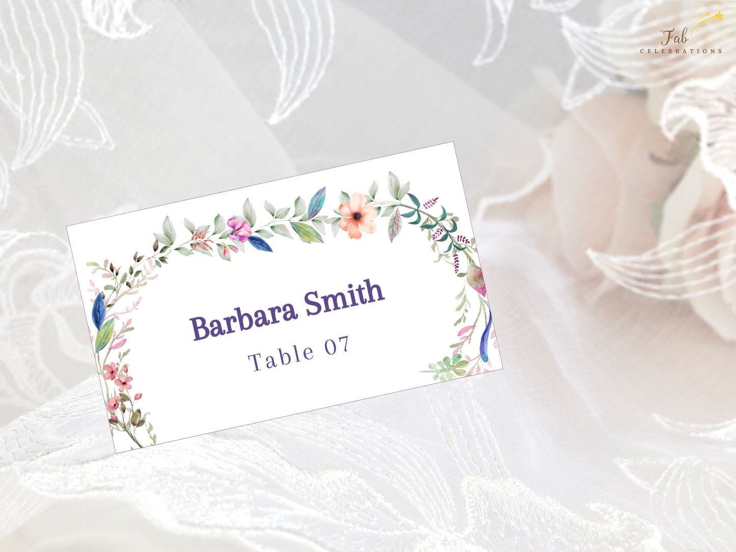 Wedding place card template rustic botanical style with watercolor floral accents and elegant typography, perfect for barn weddings and countryside receptions.