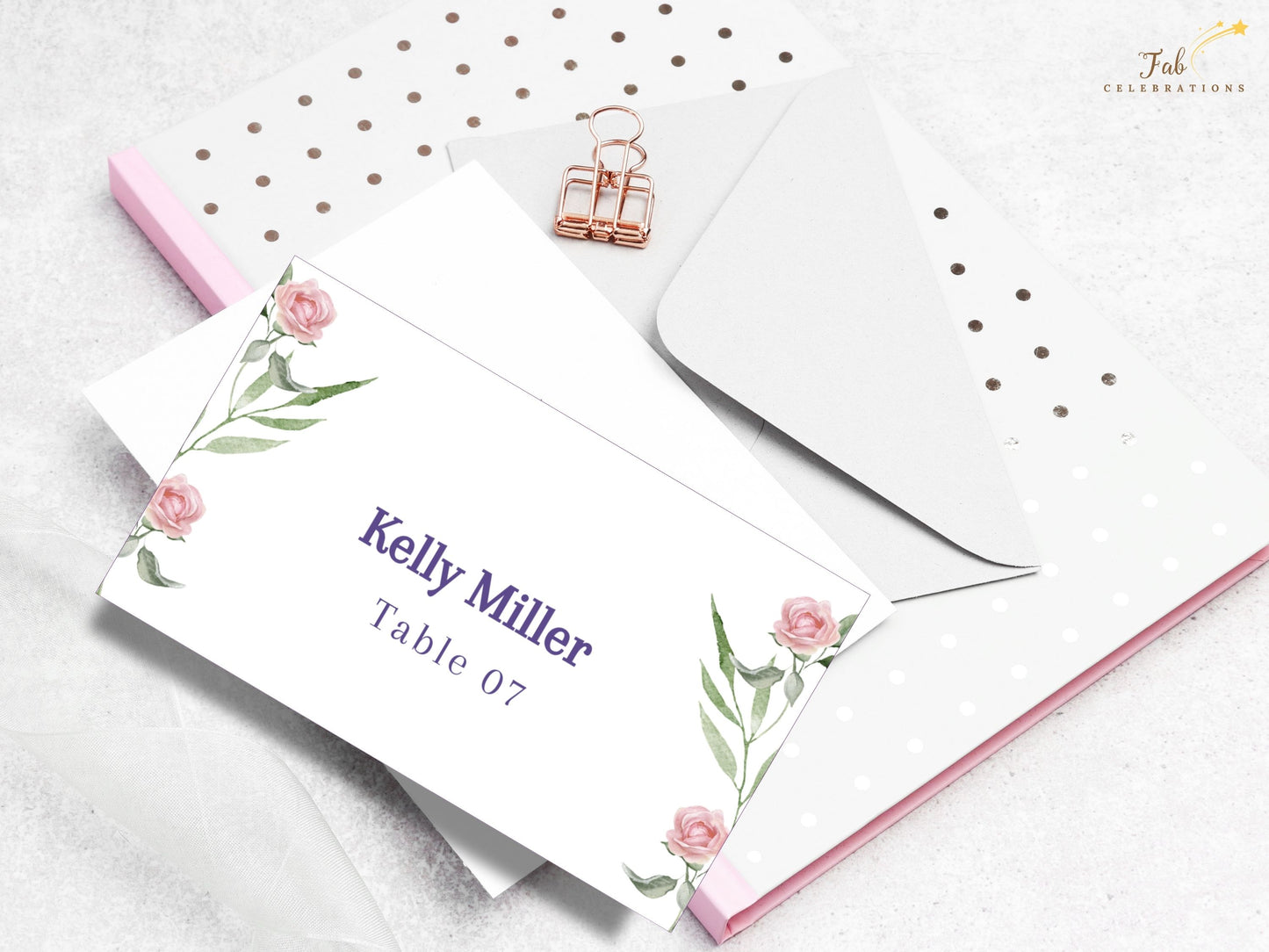 Printable wedding place card template with delicate pink rose florals — Canva design for couples seeking personalized, coordinated reception stationery.