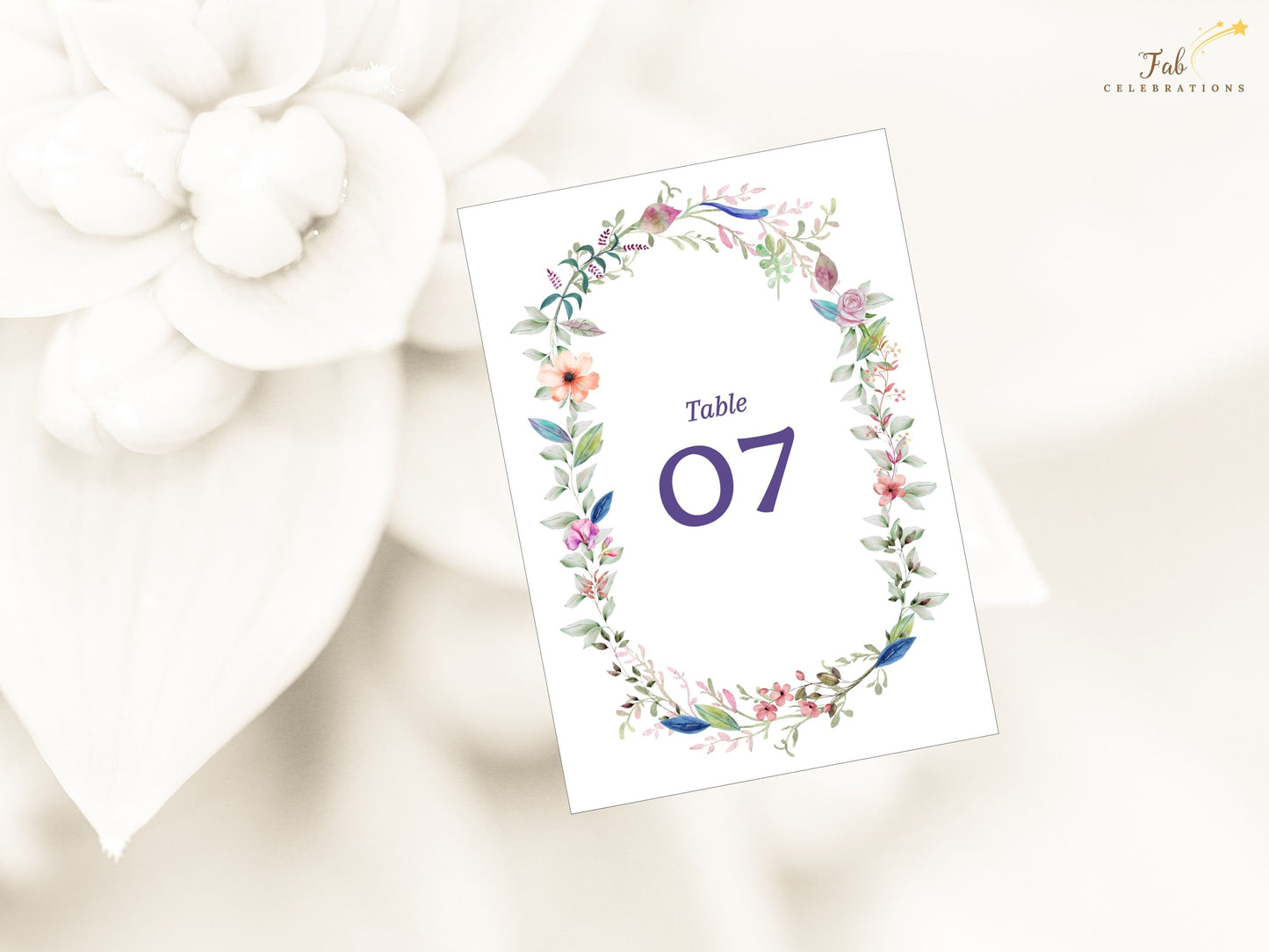 Wedding table number template modern romantic design featuring elegant typography and delicate watercolor illustrations, perfect for personalized wedding reception decor.