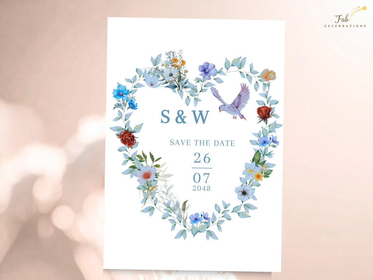 Save the date card decorated with watercolor-inspired blue florals, green leaves and two graceful doves, with elegant typography highlighting the couple's initials and upcoming wedding date.