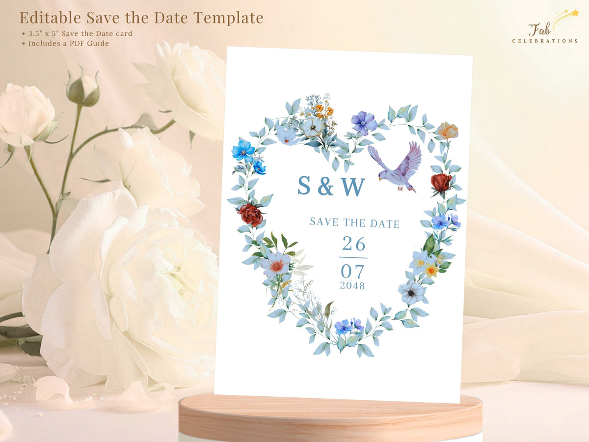 Blue and Green Save the Date Card shown as an editable Canva wedding template with watercolor-inspired blue florals, green foliage and two doves surrounding the couple's initials and celebration date.