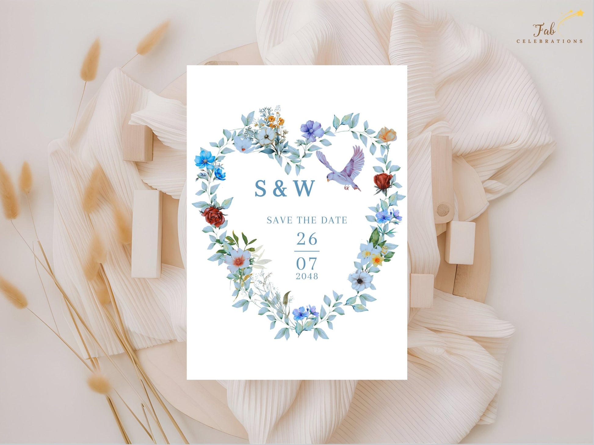 Romantic Save the Date template featuring a blue floral heart wreath, graceful dove motif and elegant typography for beautifully coordinated wedding stationery.