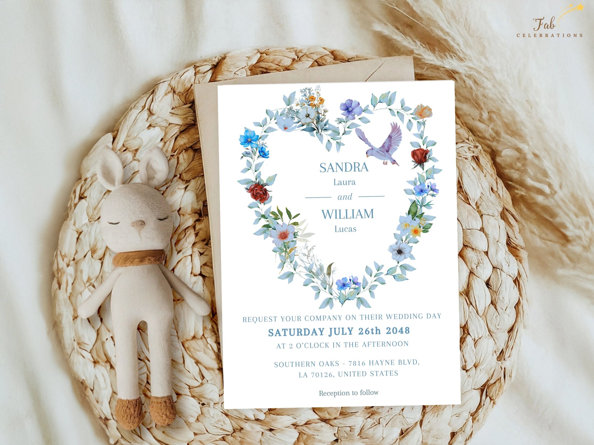 Blue floral wedding invitation template with elegant heart-shaped floral design, soft dusty blue tones and editable Canva layout for personalized wedding stationery.