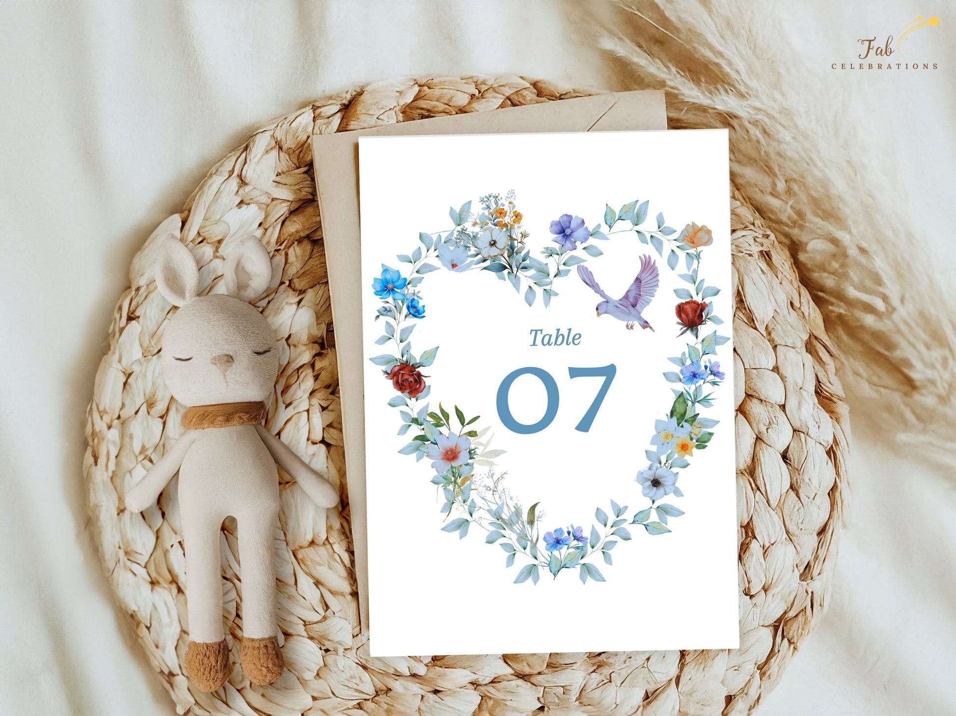 Editable Elegant Wedding Table Number Card with soft dusty blue florals, botanical heart artwork and dove symbolism designed to guide guests with timeless elegance.