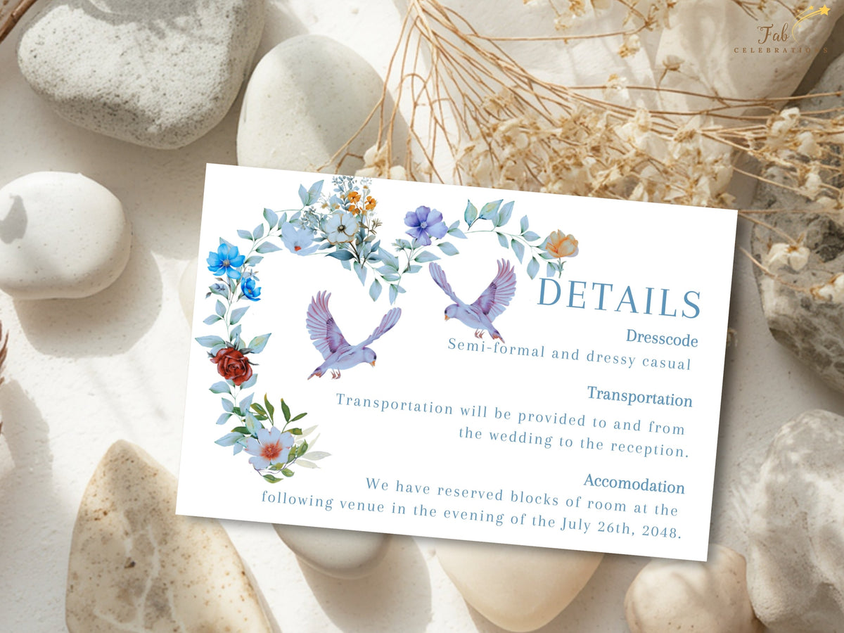 Wedding details card featuring watercolor-inspired blue florals and two doves above organized sections for general information, dress code, transportation, accommodations and wedding website details.