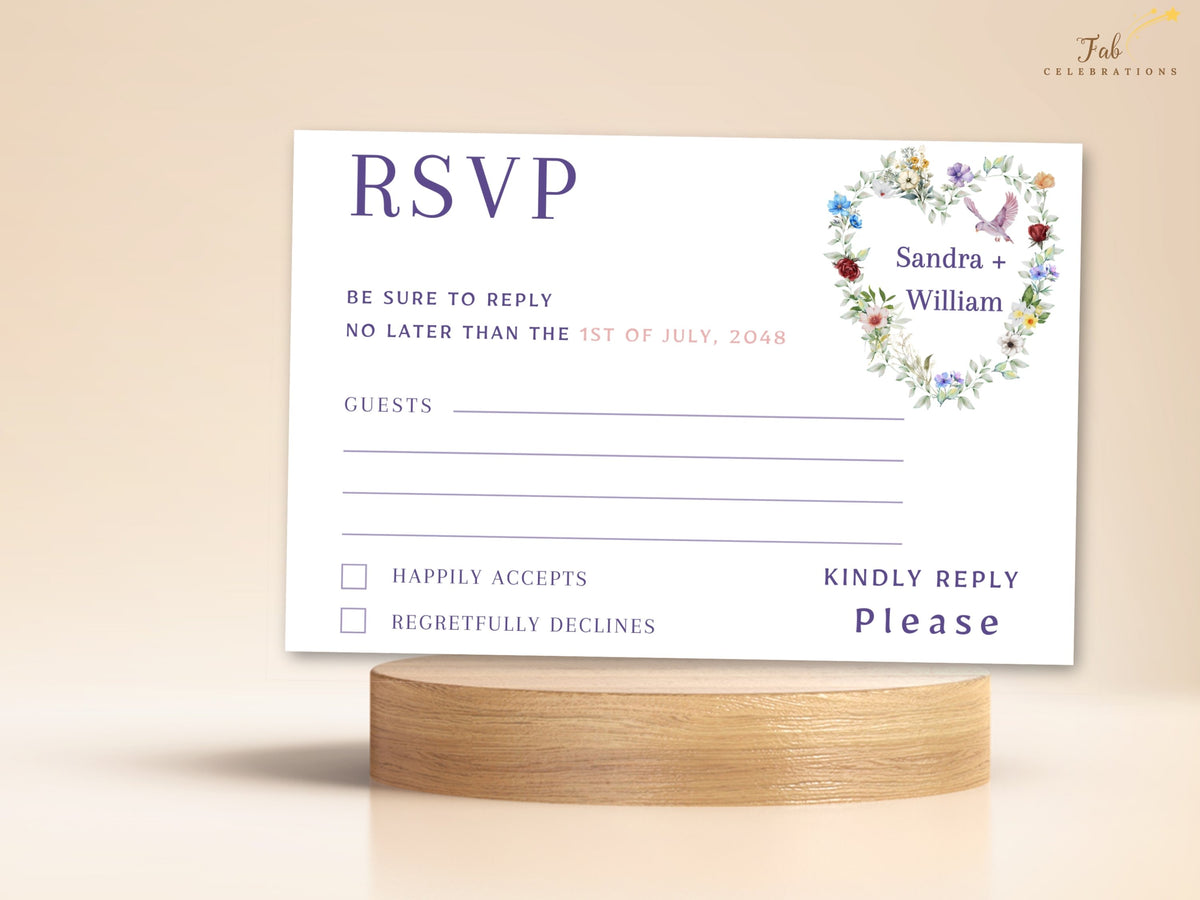 Wedding response card featuring delicate watercolor-inspired flowers and leafy greenery, elegant RSVP typography, guest information lines and clearly arranged acceptance choices.