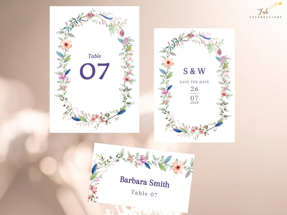 Three coordinated wedding stationery cards featuring a table number, save the date, and place card, all decorated with romantic watercolor-inspired florals and elegant typography.