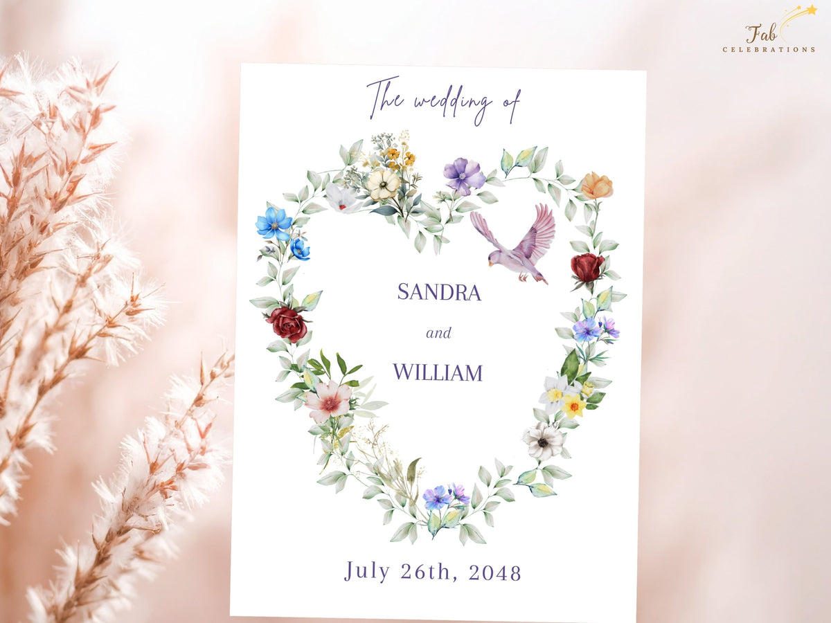 Wedding invitation back design featuring the couple's names and wedding date beneath an elegant script heading, framed by the collection's watercolor-inspired floral heart and dove artwork.