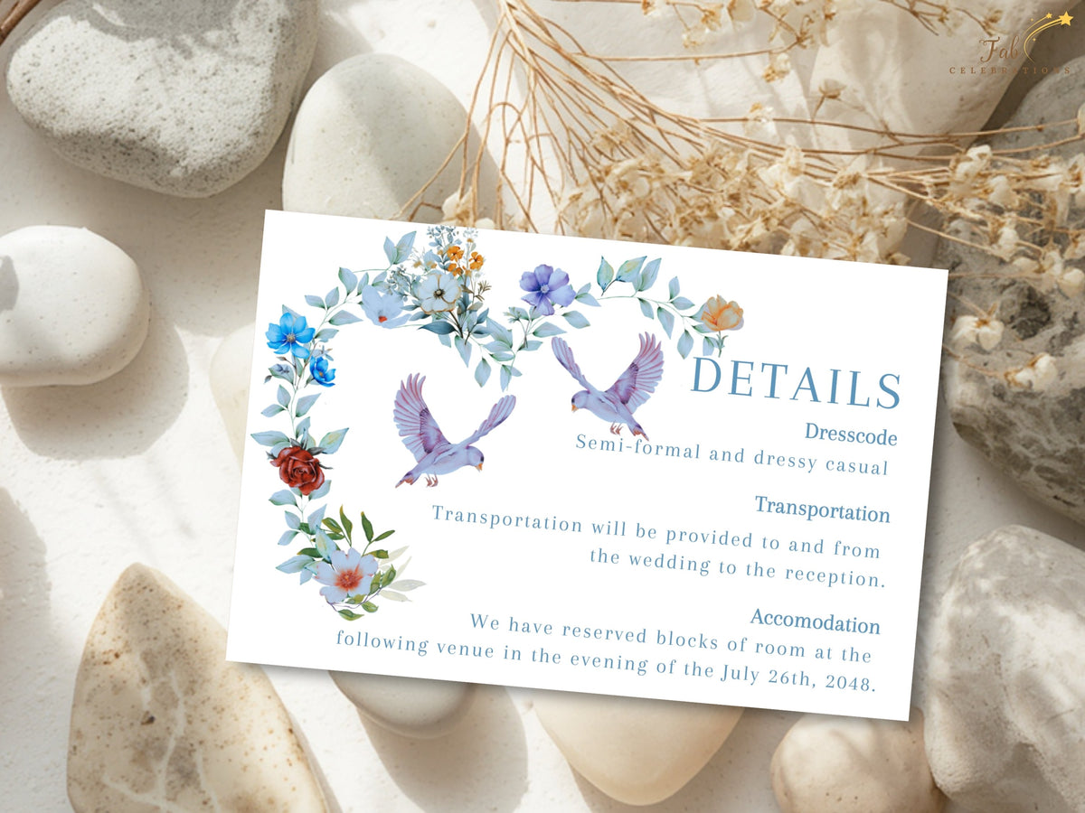 Wedding details card featuring watercolor-inspired dusty blue florals and two doves above organized sections for general information, dress code, transportation, accommodations and wedding website details.