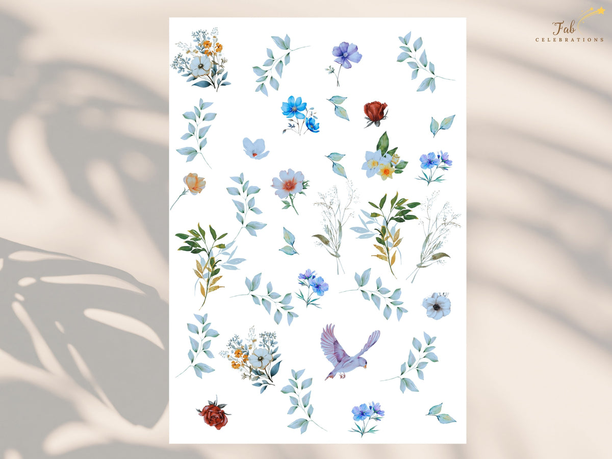 Watercolor-inspired floral element sheet featuring blue and ivory flowers, soft greenery, warm accent blooms, delicate butterflies and graceful dove illustrations used throughout the wedding collection.