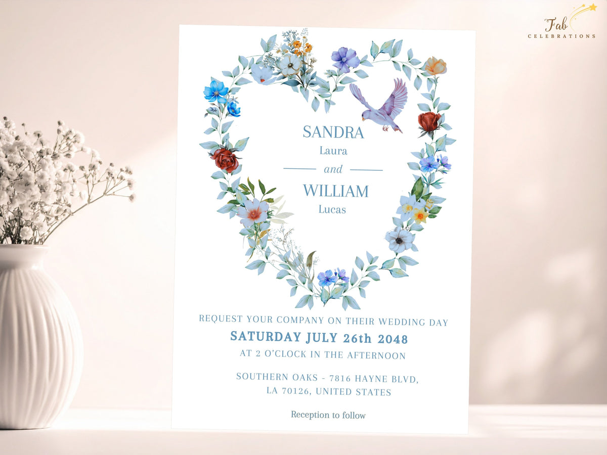 Editable wedding invitation front featuring watercolor-inspired dusty blue flowers, soft greenery and two doves arranged in a heart wreath around elegant names, date and ceremony information.