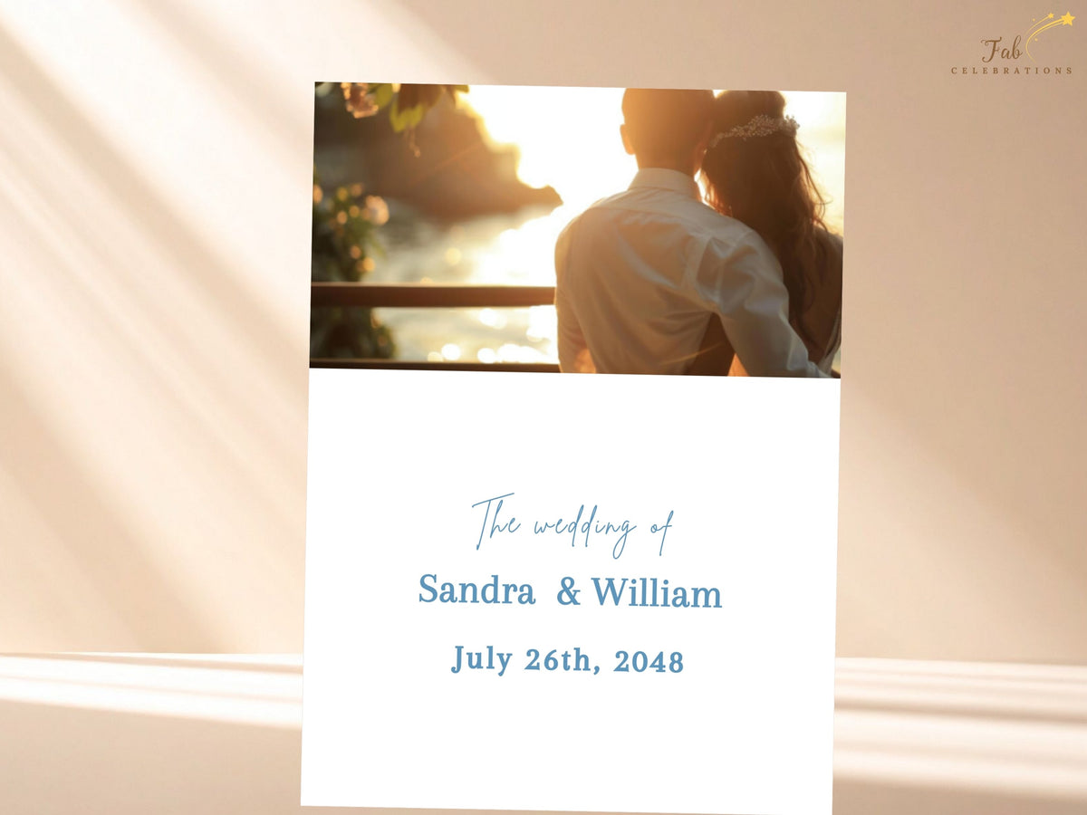 Personalized wedding invitation photo back featuring a large couple image above elegant blue typography with the couple names and wedding date, designed to coordinate with the floral invitation front.