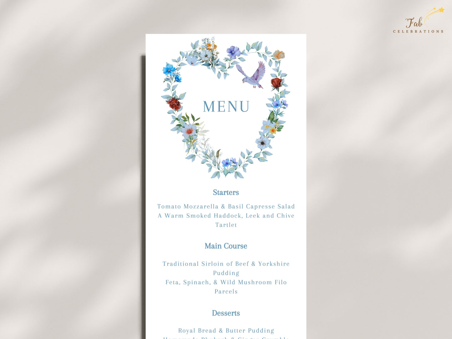 Watercolor-inspired wedding menu card featuring blue floral details, a symbolic dove and romantic artwork that complements a coordinated wedding stationery suite.