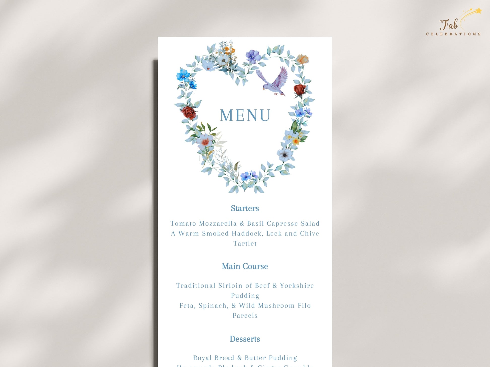 Watercolor-inspired wedding menu card featuring blue floral details, a symbolic dove and romantic artwork that complements a coordinated wedding stationery suite.