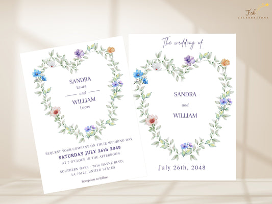 Floral Heart Wedding Invitation shown with its coordinated text back, featuring a watercolor-inspired heart-shaped wreath of airy green foliage and delicate blue, purple, white and peach flowers with elegant purple typography.