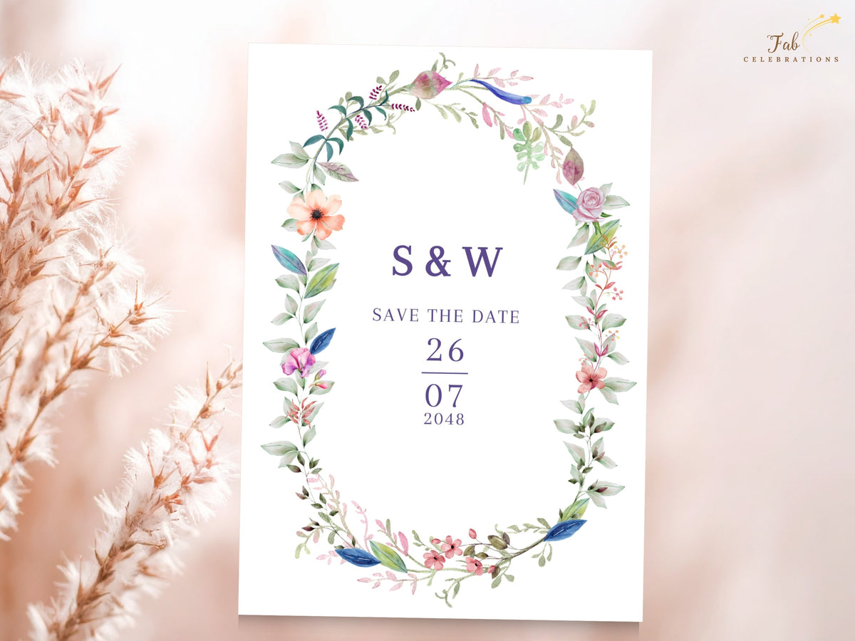 Floral save the date card with a romantic watercolor-inspired botanical wreath, elegant couple initials, announcement wording, and a personalized celebration date.