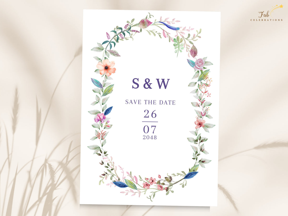 Floral Save the Date Card featuring a delicate watercolor-inspired botanical wreath surrounding elegant initials, save the date wording, and a customizable wedding date.