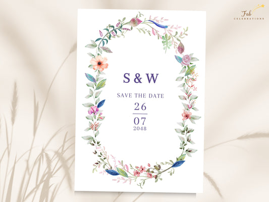 Floral Save the Date Card featuring a delicate watercolor-inspired botanical wreath surrounding elegant initials, save the date wording, and a customizable wedding date.
