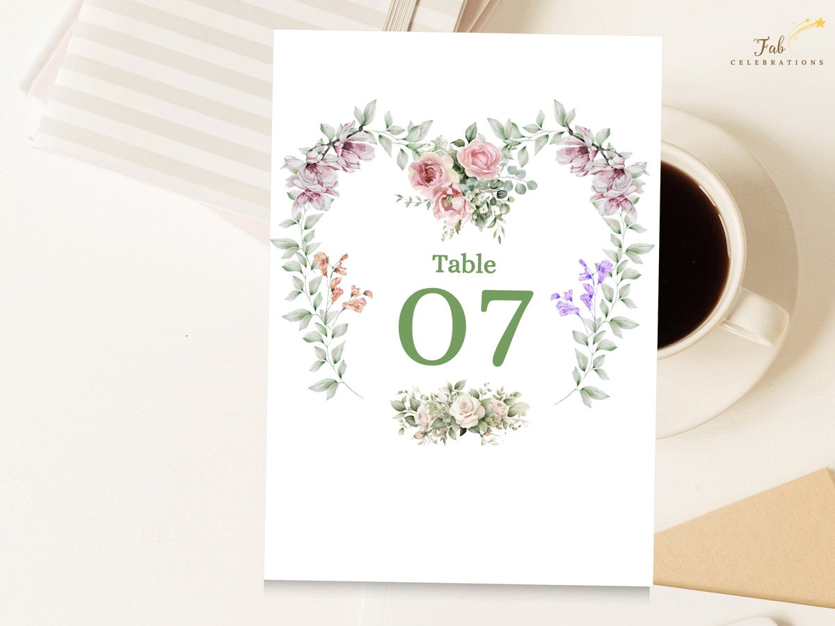 Floral Wedding Template table number card featuring Table 07 framed by a watercolor-inspired floral heart wreath with pink roses, purple blossoms, greenery and delicate botanical accents.