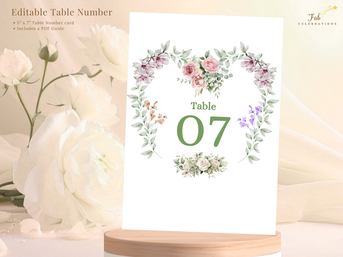 Editable table number card presented with feature text, showing Table 07 inside a romantic watercolor-inspired floral heart design with pink flowers, purple blossoms and soft greenery.