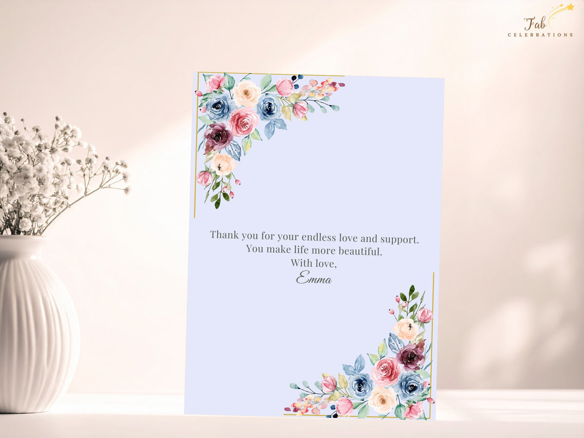 Mother’s Day invitation back featuring a heartfelt thank-you message and signature, surrounded by watercolor-inspired pink, blue, peach and burgundy flowers and greenery.