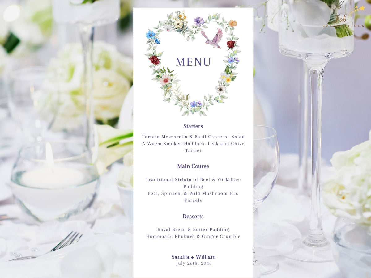Elegant dinner menu featuring a watercolor-inspired floral heart with delicate multicolored blossoms, soft greenery and a graceful dove above coordinated wedding reception courses.