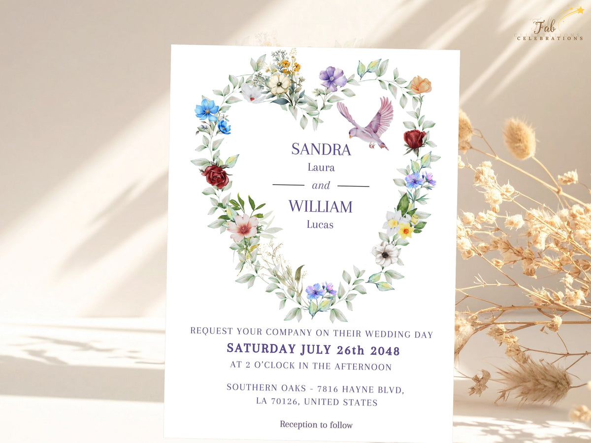 Wedding invitation front with a watercolor-inspired floral heart of colorful blossoms and delicate greenery, accented by a graceful dove and elegant typography for a romantic wedding announcement.