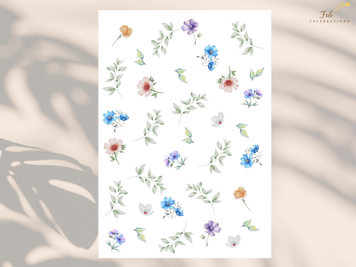 Watercolor-inspired floral element sheet showing the individual airy green foliage and delicate blue, purple, white, peach and pink flowers used throughout the Romantic Heart Wedding Collection.