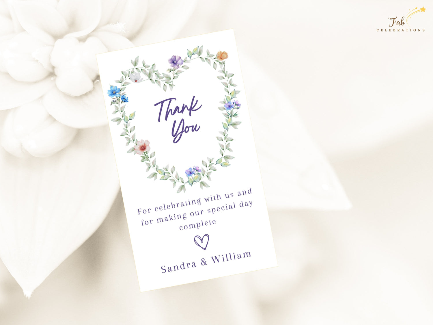 Pastel Wedding Thank You Card editable Canva template featuring a romantic heart-shaped floral wreath with pastel flowers and greenery for wedding gratitude.