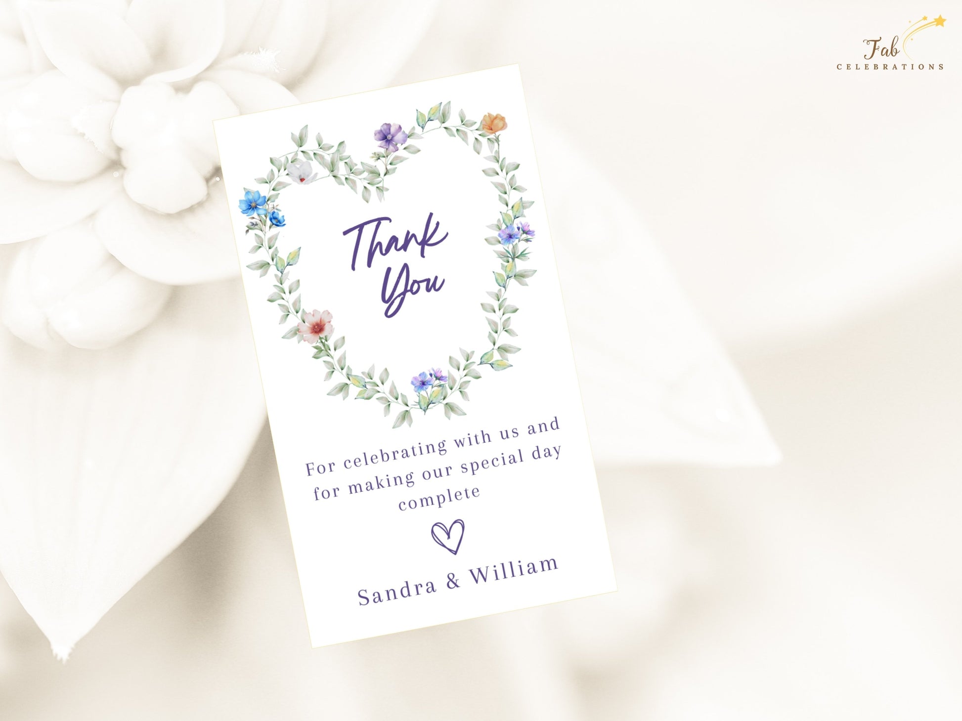 Pastel Wedding Thank You Card editable Canva template featuring a romantic heart-shaped floral wreath with pastel flowers and greenery for wedding gratitude.