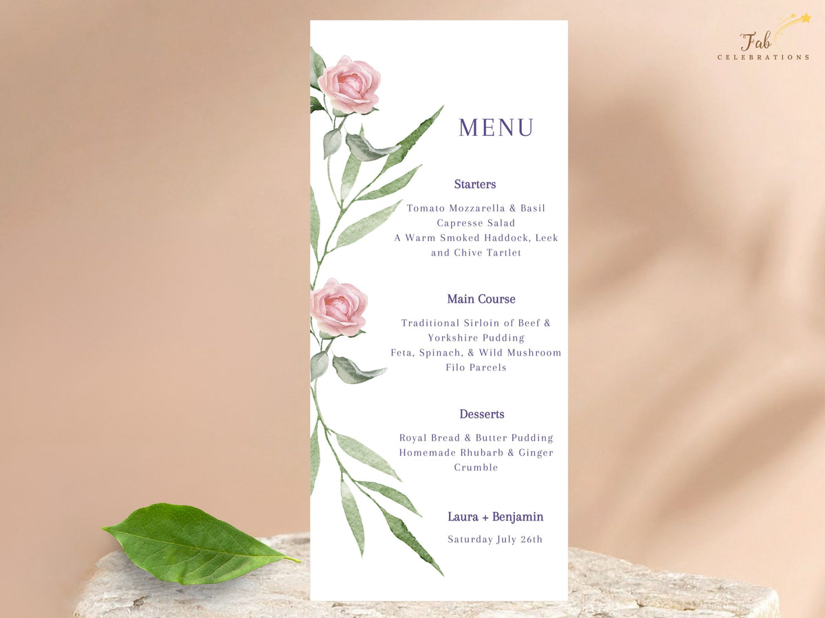Floral wedding menu card featuring blush pink roses, delicate green leafy branches and elegant typography for presenting dining details at a romantic wedding reception.