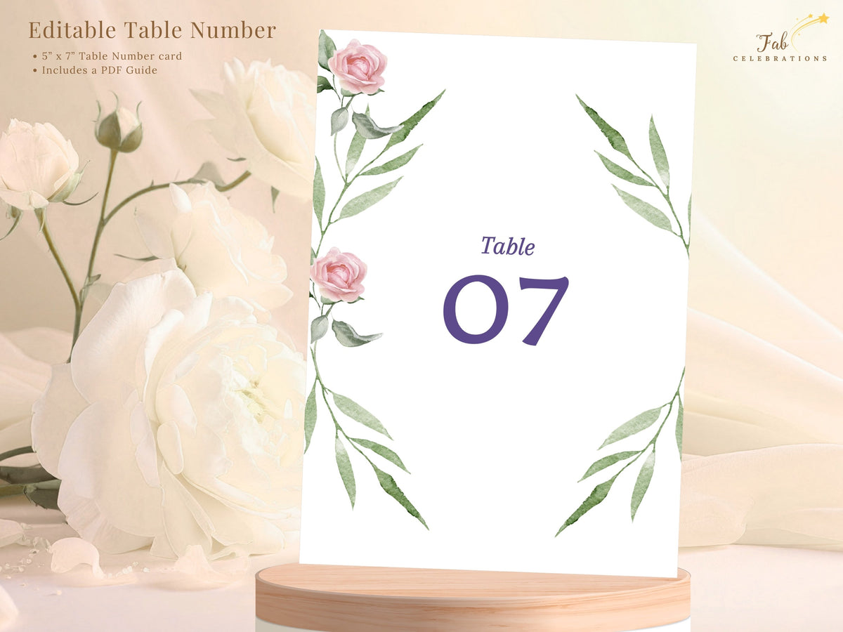 Editable wedding table number card featuring watercolor-inspired pink roses and slender green leaves around a large purple table number, designed for easy personalization in Canva.
