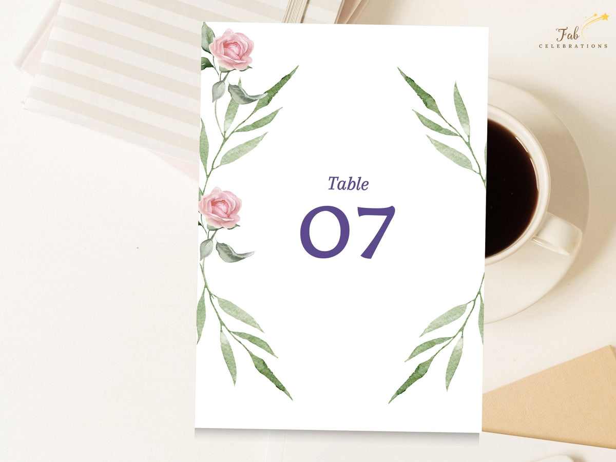 Pink Rose Wedding Table Number Card featuring watercolor-inspired blush pink roses and graceful green foliage framing a bold purple table number for an elegant coordinated reception display.