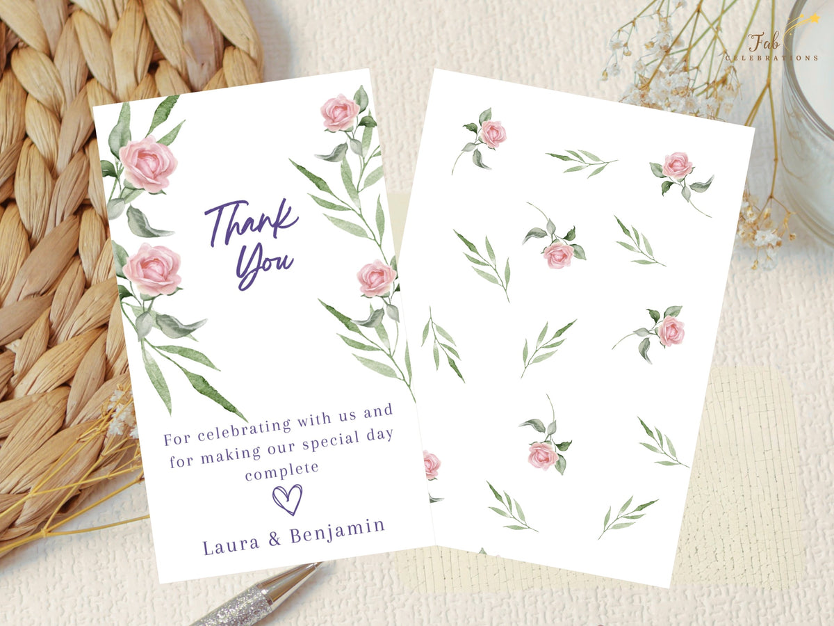 Wedding thank you card shown with its coordinating watercolor-inspired pink rose and green foliage back design, creating a cohesive floral front-and-back stationery presentation.