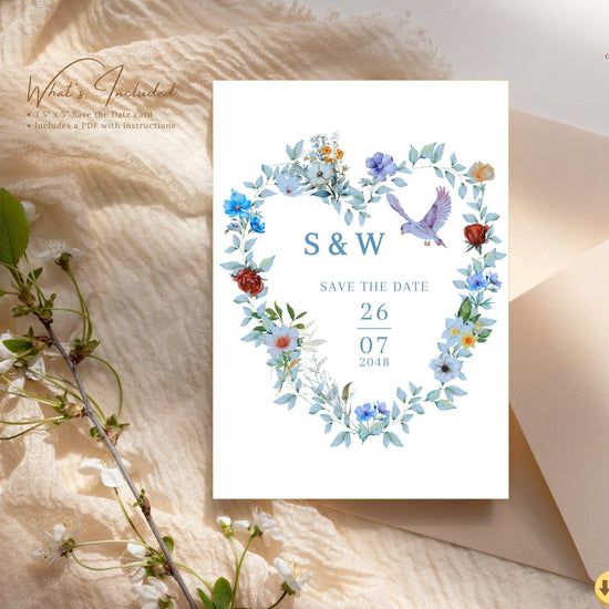Video presentation of the Blue and Green Save the Date Card featuring an editable Canva template with a watercolor-inspired blue floral heart design, graceful dove motif, romantic botanical artwork and elegant wedding announcement styling.