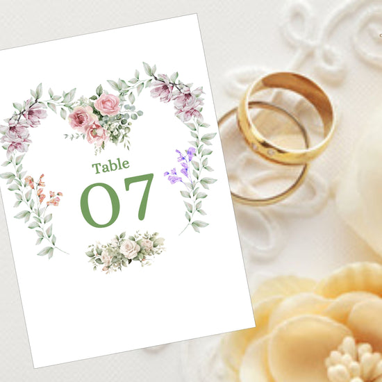 Tutorial showing how to customize floral wedding template table number cards in Canva, featuring a romantic watercolor-inspired floral heart for elegant French-inspired weddings.