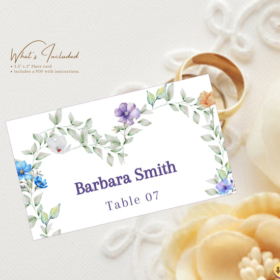 Pastel Wedding Name Card editable Canva place card template featuring a watercolor-inspired floral heart wreath, romantic botanical details, elegant typography, and coordinated wedding table seating décor