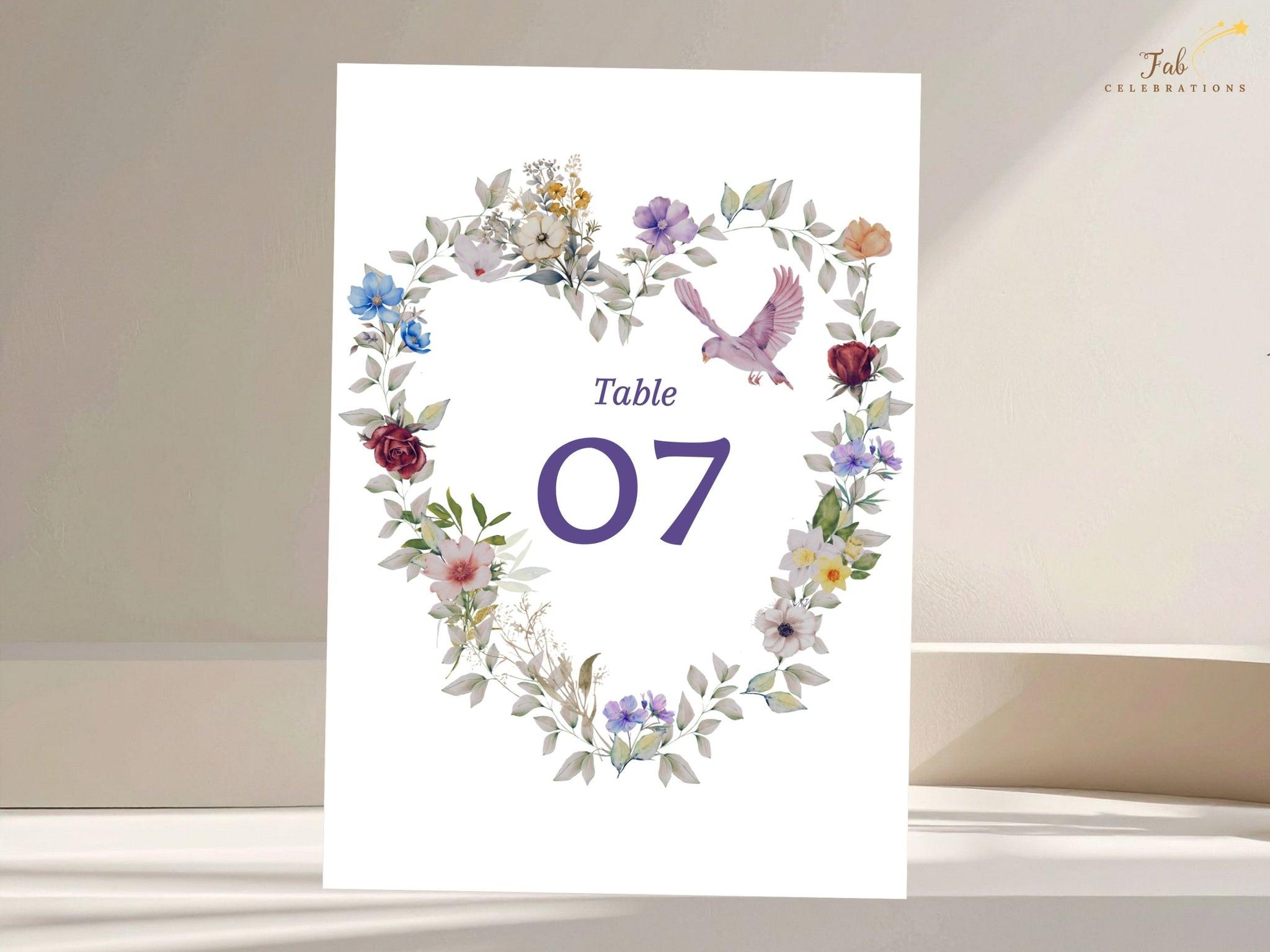 Purple Floral Wedding Table Number video showcasing an editable Canva table number card with watercolor-inspired floral heart and dove artwork, designed to add romantic elegance to wedding reception tables.