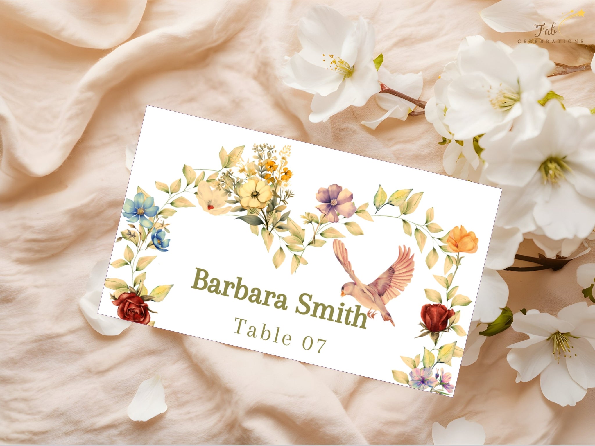 Video showcasing the Romantic Wedding Name Card featuring a watercolor-inspired half floral heart wreath, graceful dove illustration, soft beige background and editable Canva template for elegant wedding place settings.