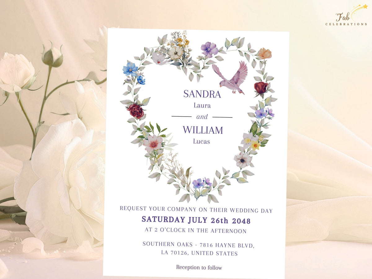 Front of a purple floral wedding invitation featuring a watercolor-inspired heart-shaped floral arrangement, graceful dove illustration, and refined lettering for a romantic wedding day.