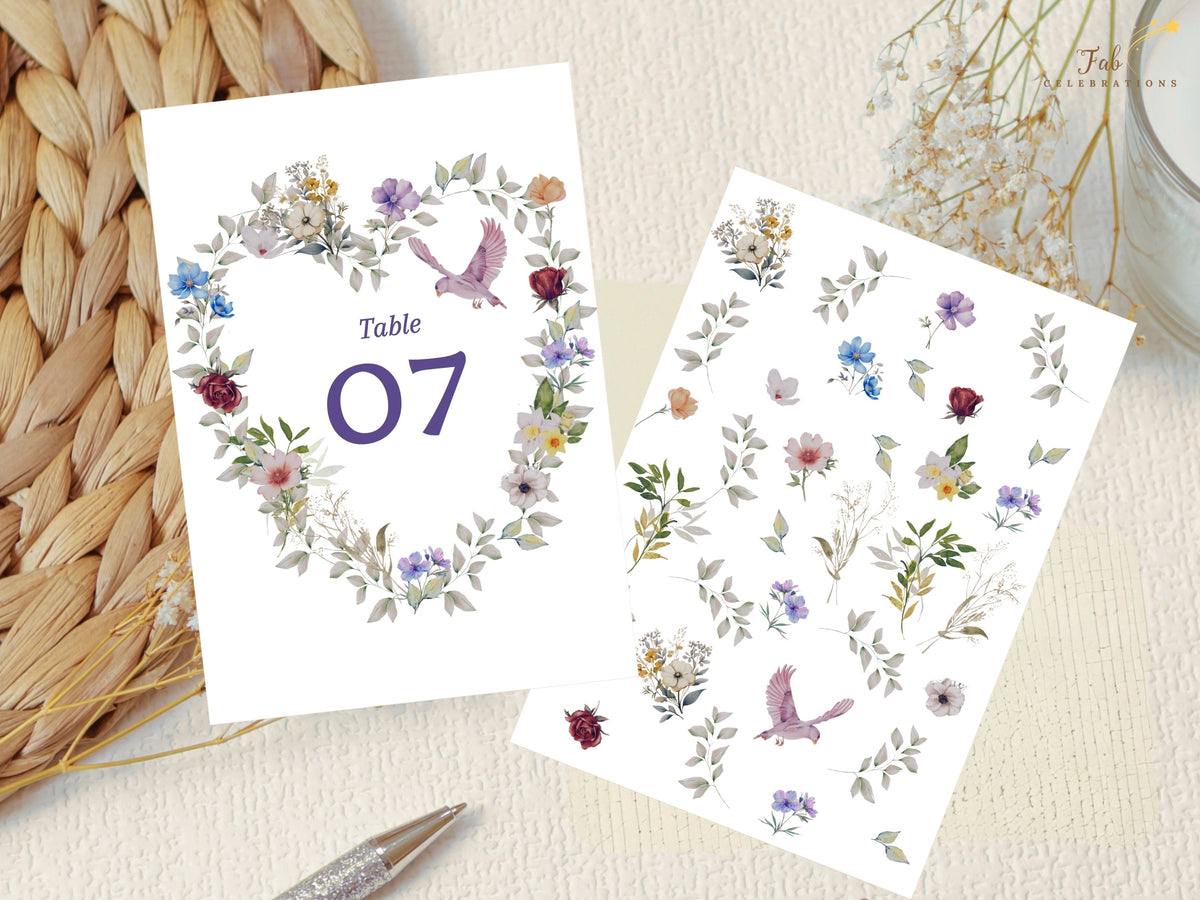 Wedding table number seven shown alongside the matching botanical artwork sheet, highlighting watercolor-inspired flowers, leaves and a pink dove from the collection. Editable in Canva.