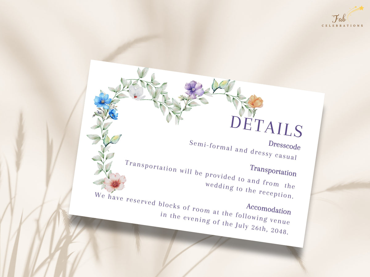 Wedding details card featuring watercolor-inspired greenery and delicate pastel blue, purple, white, peach and pink flowers around editable dress code, transportation and accommodation information in elegant purple typography.
