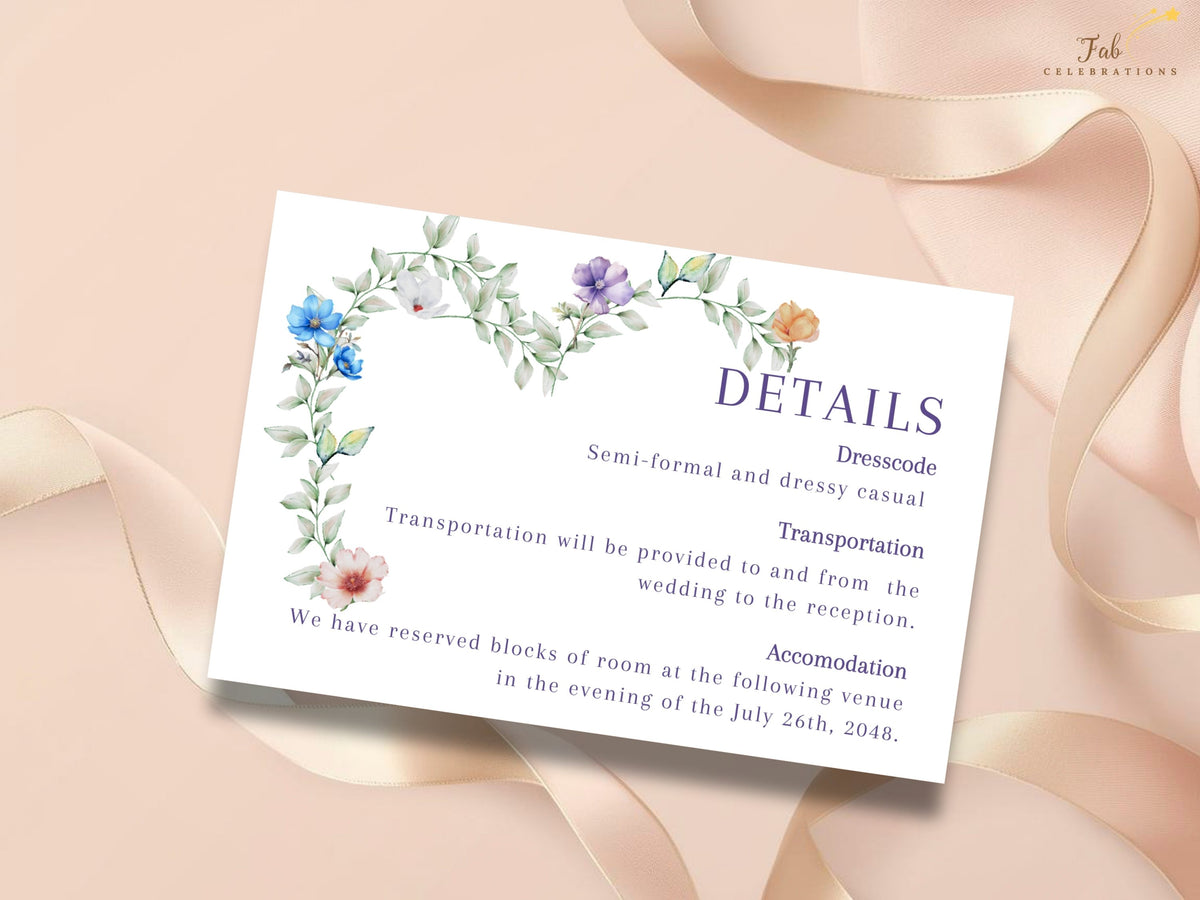 Soft Floral Wedding Details Card featuring elegant purple typography framed by watercolor-inspired greenery and delicate blue, purple, white, peach and pink flowers, with editable sections for dress code, transportation and accommodation.