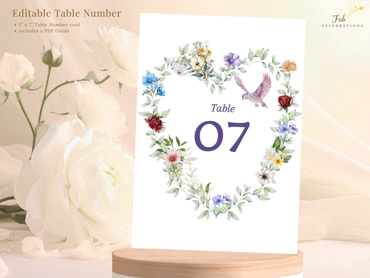 Watercolor Dove Wedding Template editable table number card featuring a watercolor-inspired heart of delicate flowers and greenery with a dove surrounding the elegant reception number 07.
