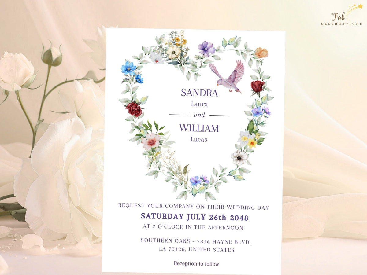 Watercolor Wedding Invitations card featuring a romantic heart-shaped arrangement of colorful flowers and soft greenery with a graceful flying dove surrounding elegant wedding typography.