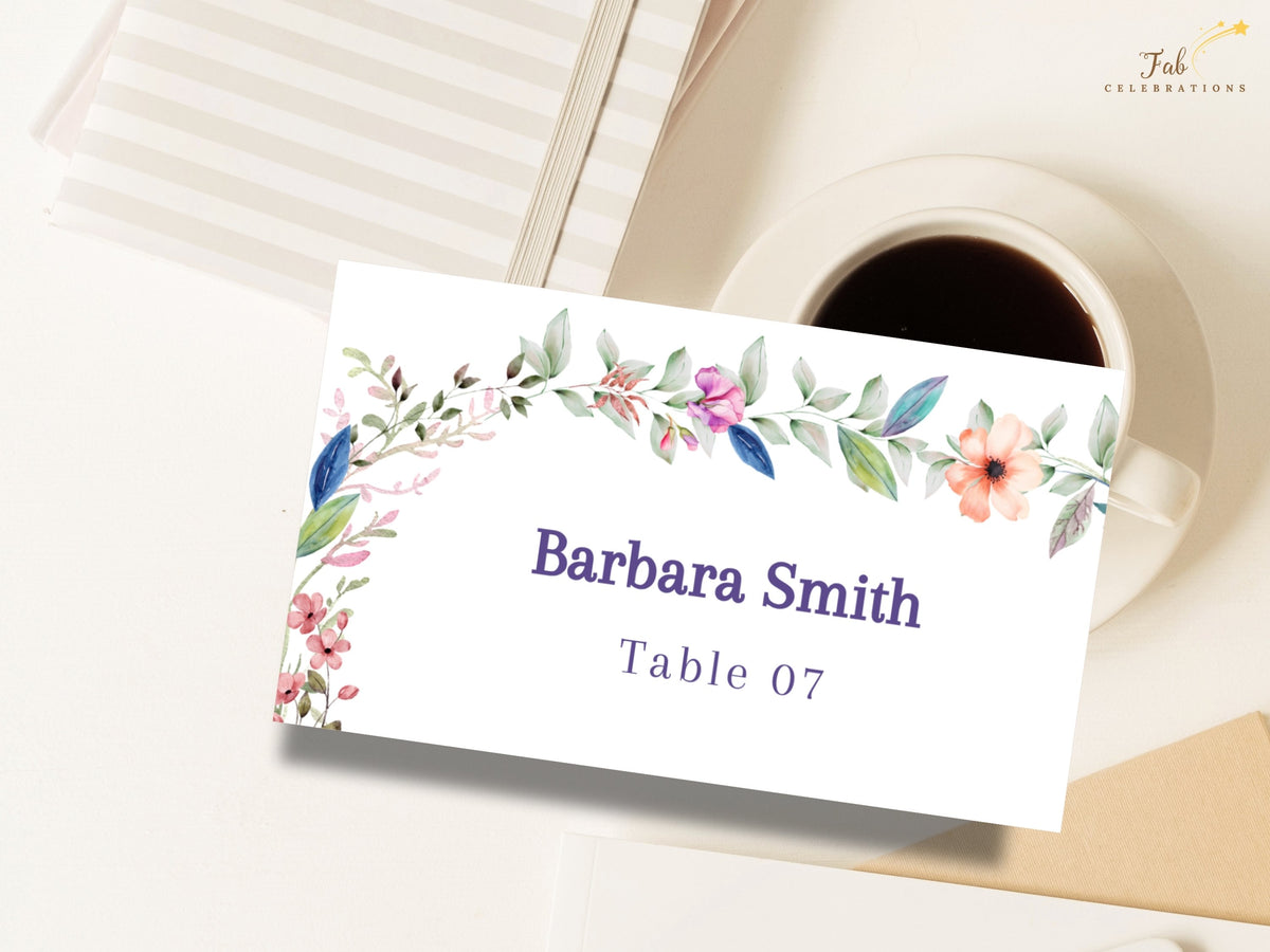 Elegant Canva wedding seating card featuring watercolor-inspired floral accents with editable guest name and table number for coordinated reception tables.