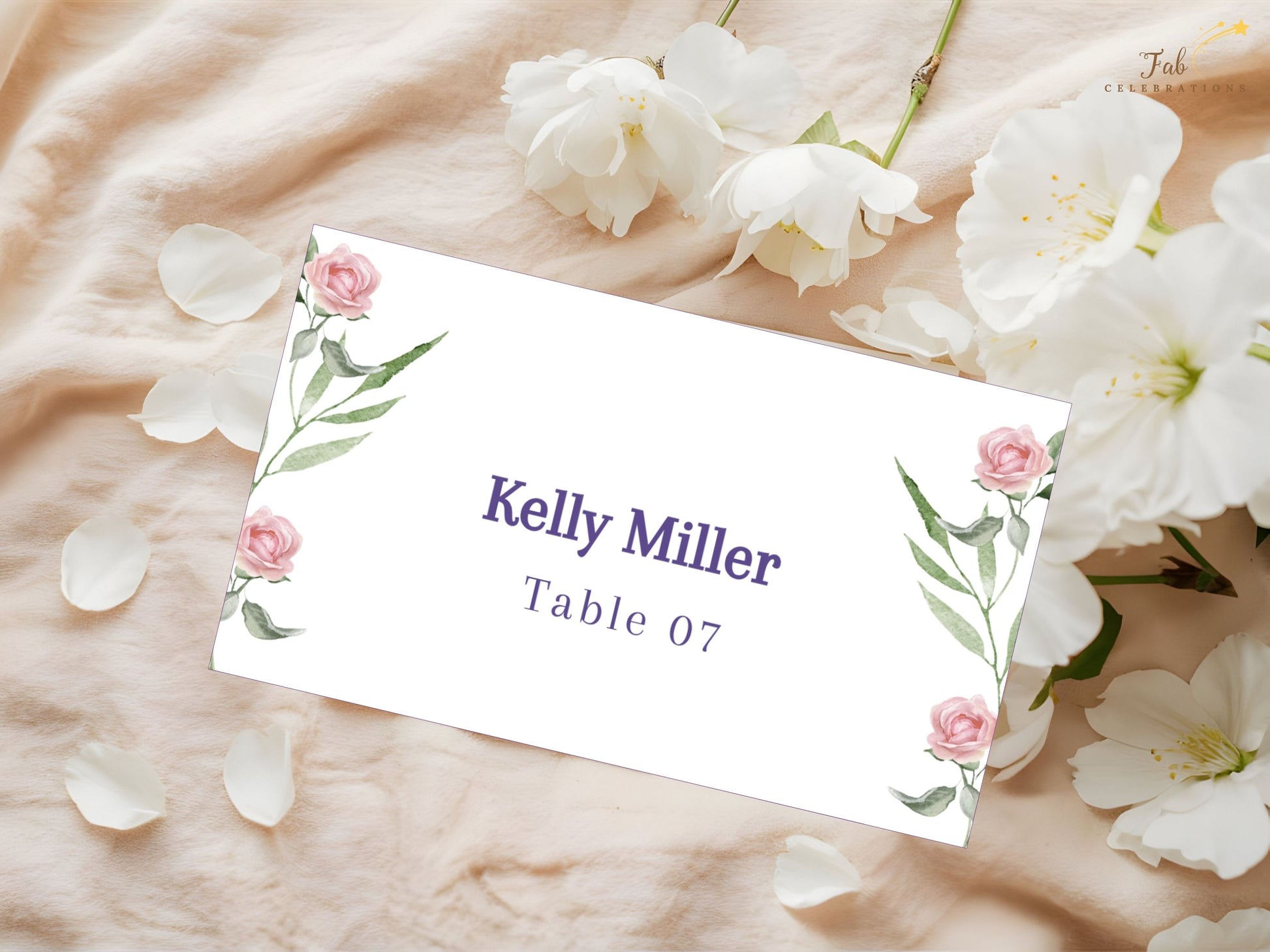 Wedding place card template with watercolor pink roses and greenery — editable Canva design for personalized reception seating with elegant floral charm.