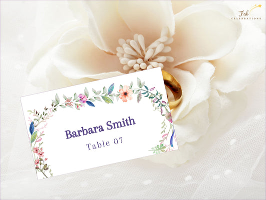 Wedding place card template boho floral design with watercolor elements, editable Canva file for personalized guest names, printable escort cards for rustic receptions.