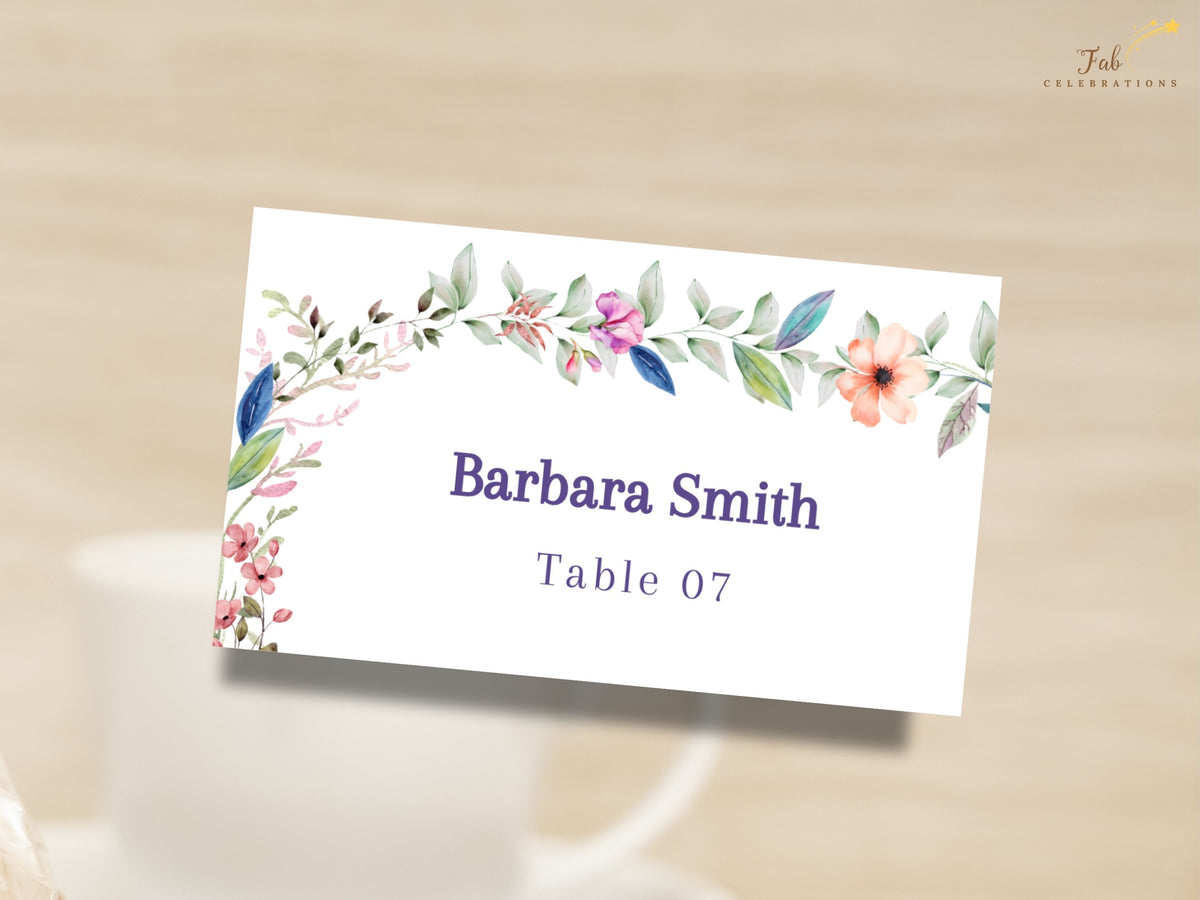 Wedding Place Card featuring a watercolor-inspired floral design with editable guest name and table number for personalized wedding reception seating.